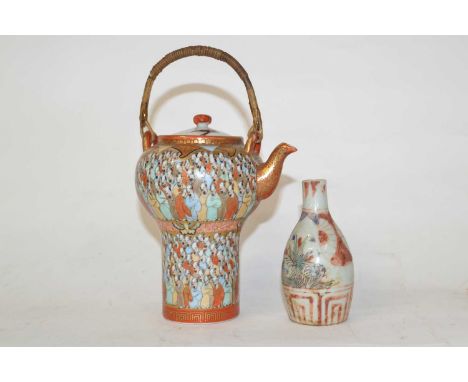 A Japanese porcelain Satsuma type pot and cover decorated with Sages together with a small porcelain vase