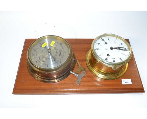 Two mounted ships clocks and a barometer, the clock marked Schatz Royal Mariner with keys on wooden mount