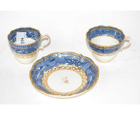 A Caughley trio with printed blue and white borders and gilt highlights, factory S mark to base, also label for the Edmundson