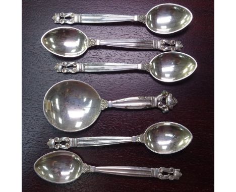 A set of 5 Georg Jensen Danish sterling silver teaspoons, and matching caddy spoon 