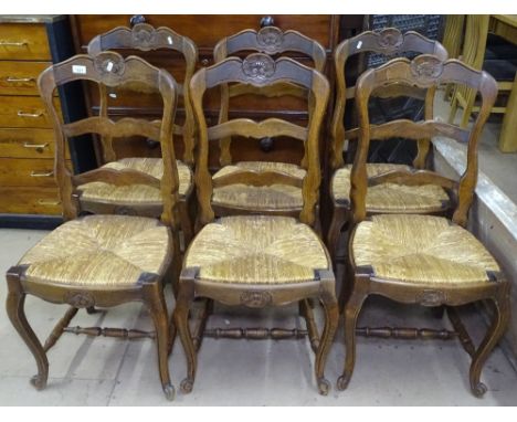 A set of 6 French oak ladder-back rush-seated dining chairs 