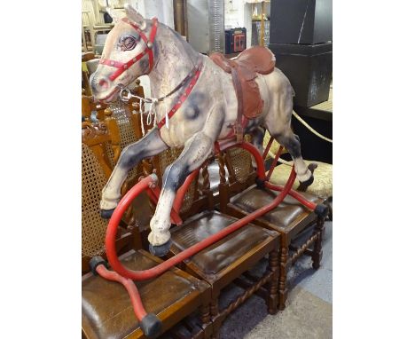 A Vintage Tri-Ang painted metal rocking horse 