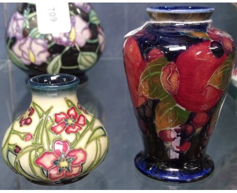 A Moorcroft tube-lined vase, 67/150, and a Vintage Moorcroft vase 