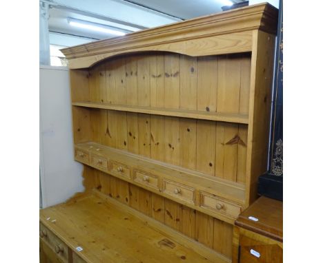 A modern polished pine kitchen 2-section dresser, top having open plate rack with fitted spice drawers, above a base of 3 fri