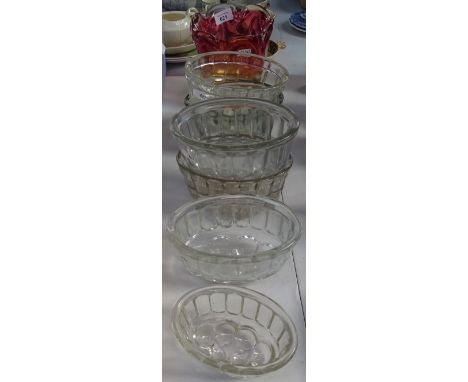 An Art glass vase, 17cm, and 6 glass jelly moulds 