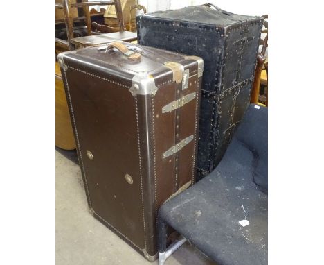 2 Vintage steel-bound travelling wardrobe trunks, with fitted interiors 