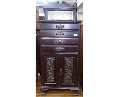 An Art Nouveau mahogany 4-drawer music cabinet, with raised mirror-back, W47cm 