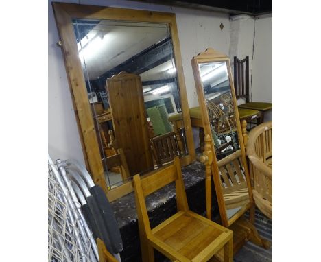 A pair of large pine-framed lead-light decorated wall mirrors, a pine chevel mirror with base, and upholstered stool 