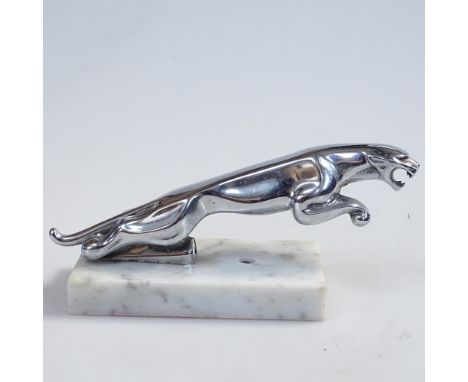 A Vintage chrome Jaguar car mascot on alabaster plinth, length 19cm 