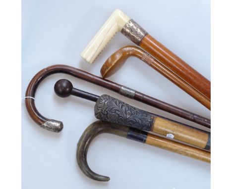 Walking sticks with silver mounts, a horn-handled stick etc (6) 