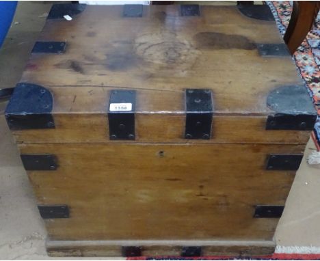 A 19th pine and steel-bound trunk, of small size, W55cm, H49cm 