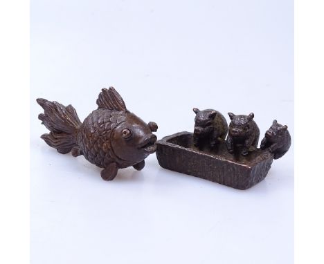 An Oriental bronze fish, length 7cm, and a miniature bronze depicting 3 pigs at a trough 