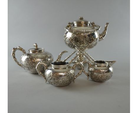 Chinese silver four piece tea service comprising tea pot, cream jug, sugar bowl, kettle on stand, with embossed chrysanthemum