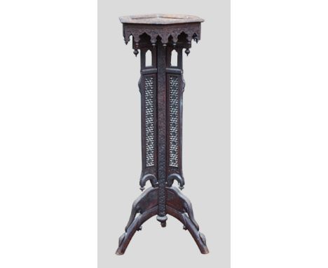 Indian carved hardwood and fret work jardiniere stand on tripod base, 108cm high, 