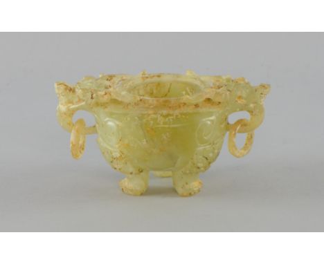 Chinese green jadeite censer with ring and beast mask handles on three paw feet, 7.5cm high, Numerous natural faults. Lacks c