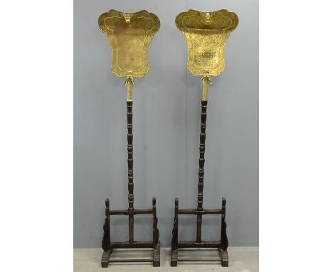 Pair of Chinese gilt bronze fan shaped banner plaques supported on tall turned wooden poles, each banner has a cast gilt bron