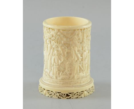 19th century Chinese carved ivory brush pot, with six figures and a horse in a landscape setting, pagodas and mountains, on a