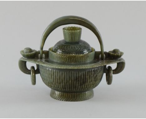 Chinese spinach jade censer and cover with ribbed body scrolling and floral decoration, twin-ring and swing handle, 11.5cm hi