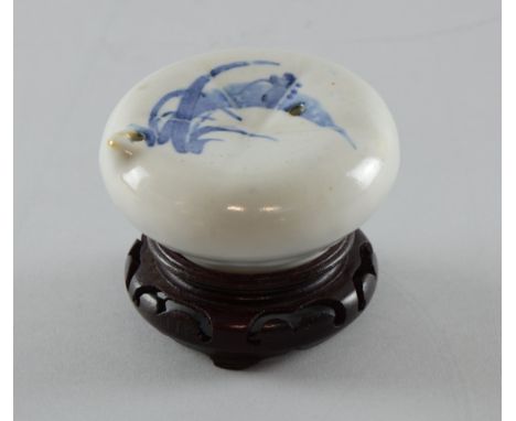 Chinese blue and white incense stick holder decorated with grasses, 8cm diameter, Minor glaze faults and some crazing.