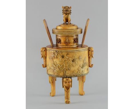 Early 20th century Chinese carved and stained ivory censer the pierced cover with lion finial, the main body with floral deco