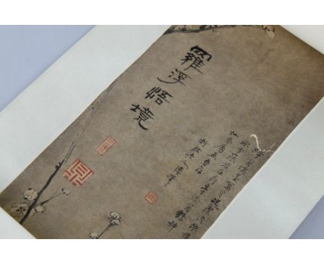 Chinese scroll depicting blossoming prunus, with calligraphy and three red stamp marks, 91cm x 17.5cm, Minor foxing mostly to