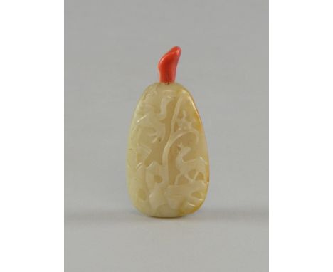 Chinese pale celadon jade and brown mottled snuff bottle and  coral stopper carved with a crane and deer on hardwood stand in