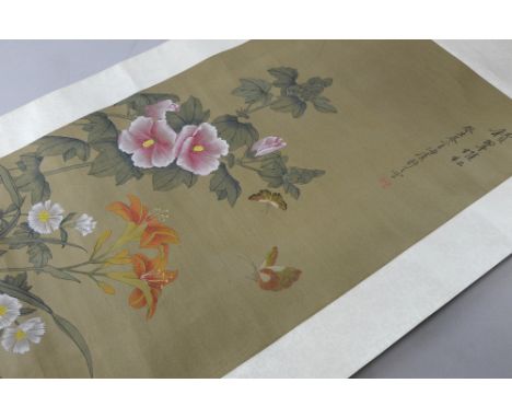 Chinese scroll depicting blossoms and butterflies, with calligraphy and red stamp mark, image size 82cm x 37cm, boxed, A few 