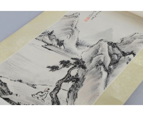 Chinese scroll depicting a seated man beneath a tree on a ledge on a cliff side, with calligraphy and red stamp marks, 65cm x