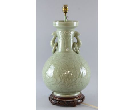 Chinese celadon ground vase with ring handles, moulded scrolling floral and foliate decoration, converted into a lamp, 44cm h