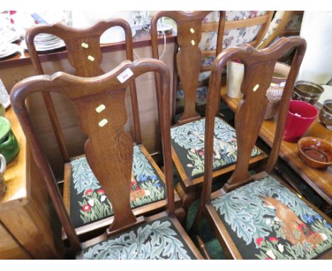 SET OF FOUR OAK FRAMED DINING CHAIRS WITH TAPESTRY STYLE SEATS DEPICTING FOX AND HARES