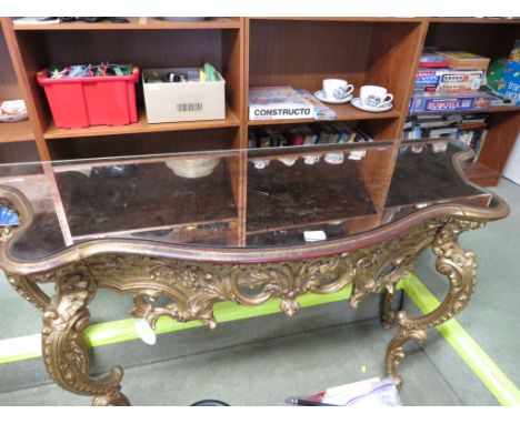 REPRODUCTION CONSOLE TABLE WITH ORNATE GILT WOOD MOULDINGS AND MIRROR TOP