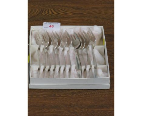 SET OF TWELVE WHITE METAL DESSERT FORKS MARKED GEORG JENSEN STERLING DENMARK, COMBINED WEIGHT 11.5 OZT, WITH K THIEL KRAGH CA