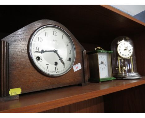 CHIMING MANTLE CLOCK IN OAK CASE, QUARTZ CARRIAGE CLOCK AND GLASS DOMED MANTLE CLOCK