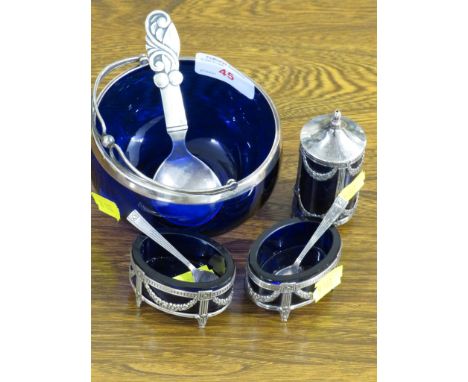 A BLUE GLASS SUGAR BOWL WITH 830S WHITE METAL MOUNTS, A HAANDSMEDET CADDY SPOON WITH DECORATIVE TERMINAL, AND A SWEDISH SILVE