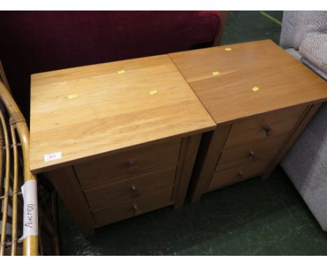 PAIR OF MODERN LIGHT OAK THREE DRAWER BEDSIDE CHESTS.