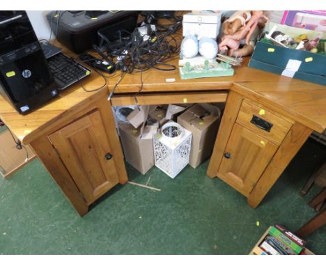 LIGHT OAK CORNER DESK WITH TWO CUPBOARD DOORS AND SINGLE DRAWER, KEYBOARD SHELF.