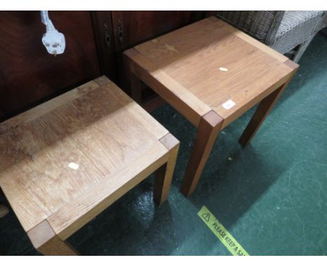 TWO LIGHT OAK OCCASIONAL TABLES.
