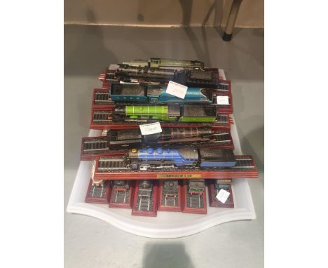 Seventeen Model steam locomotives on plinths.
P&amp;P Group 3 (£25+VAT for the first lot and £4+VAT for subsequent lots) 
