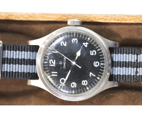 A gentleman's stainless steel British Military Omega RAF pilots wristwatch dated 1956, with black dial manual wind, case Diam