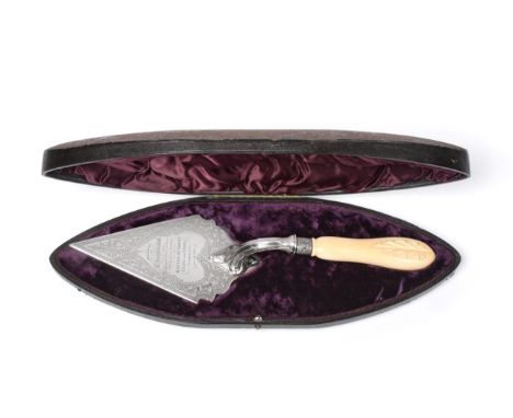 A Victorian Silver Presentation Trowel, W W Harrison & Co, Sheffield, 1892, with carved baluster ivory handle, the blade with