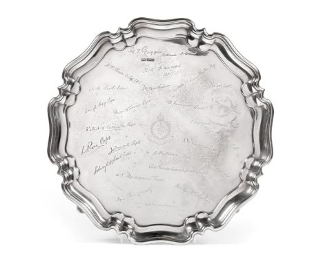 A George V Presentation Silver Salver, Atkin Brothers, Sheffield 1917, with shaped rim on scroll supports, engraved to the ce