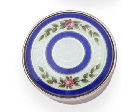 A Silver and Enamel Pill Box, maker's mark rubbed, Birmingham 1910, circular with pull off cover, decorated with roses on a p
