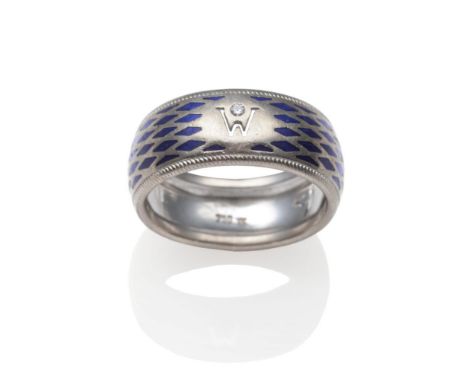 A Diamond and Blue Enamel Band Ring, by Wellendorff, inset with a round brilliant cut diamond above a pierced 'W' and picked 