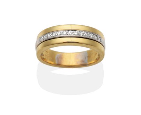 An 18 Carat Gold Diamond Triple Band Ring, round brilliant cut diamonds to a central white gold band between two plain yellow