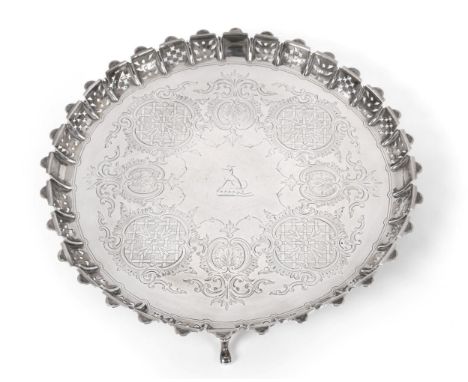 A Victorian Circular Silver Salver, Horace Woodward & Co, London, 1875, with scalloped and pierced border, on four scroll sup