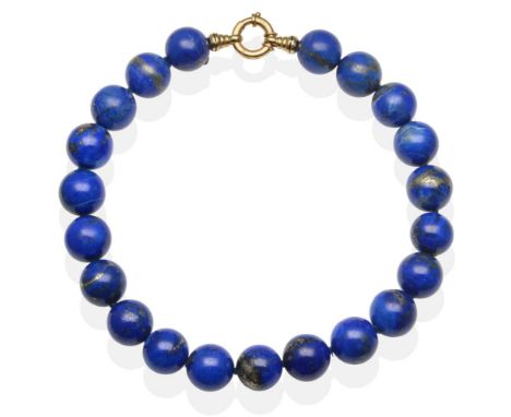 A Lapis Lazuli Necklace, round beads knotted to a bolt ring clasp, length 43.5cm see illustration  The necklace is in good co