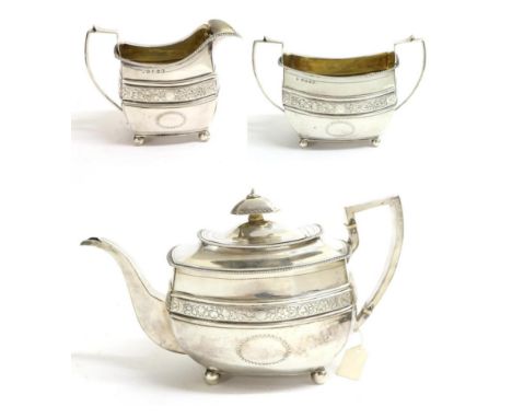 A George III Silver Three Piece Tea Service, Daniel Urquhart & Naphtali Hart, London 1808, rectangular with gadroon borders, 