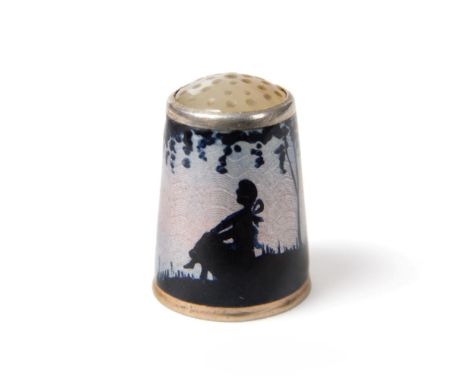 A Norwegian Silver and Enamel Thimble, Askel Holmsen, Sandefjord, mid 20th century, decorated with a silhouette of a girl sea