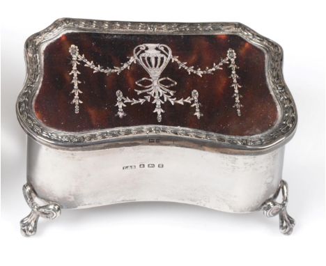 An Edwardian Silver and Tortoiseshell Trinket Box, Levi & Salaman, Birmingham 1906, of shaped rectangular form, the hinged co