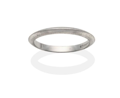 A Platinum Tiffany & Co Band Ring, of knife edge design, finger size K, boxedThe ring is in good condition. It is hallmarked 